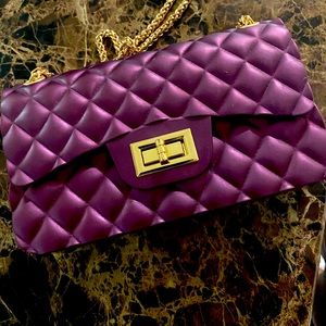 I’m selling a purple purse and a lot more